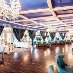 restaurant hall with turquoise chairs french windows navy coloured ceiling 140725 8448